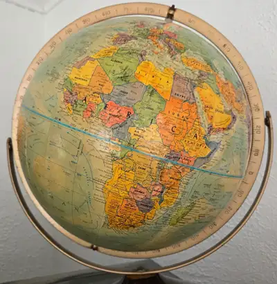 Vintage Replogle World Nation series globe with a 12-inch diameter. It features a raised relief topo...