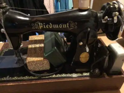Piedmont portable sewing machine from perhaps 60-75 years ago. Machine is in excellent condition inc...