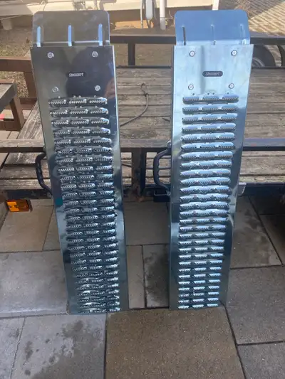 3 feet new ramps, good for trailer or car, never been used, pick up in St Catharines