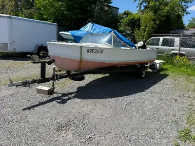 Thornes Aluminum Boat with Engine and Trailer. Engine not running and boat needs work, but does not...