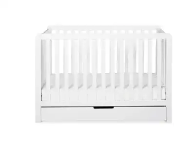 The Carter’s Colby 4-in-1 Convertible Crib with Spacious Trundle Drawer features clean lines and a s...
