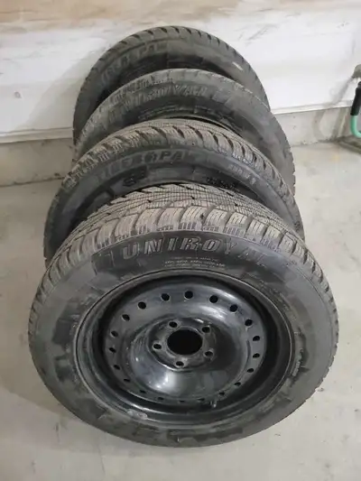 4 Uniroyal Tiger Paw Ice & Snow Tires on 15" Black Steeles for Sale. **185/65/R15** Great Condition....