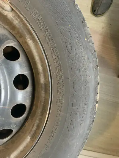 4 Tires and rims from a Hyundai Accent. 2 with decent tread and 2 not so good