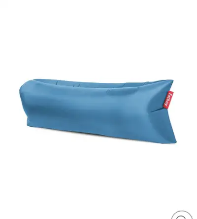 Brand new never used Aqua blue Lamzac by Fatboy is a lounge bed that you can fill with air within a...