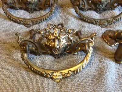 Solid brass handles (various pieces) and Vintage finger pulls, View more