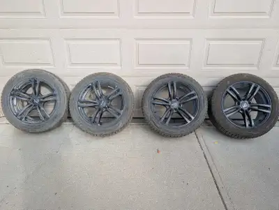 Set of 4 TOYO Observe GSI6 225/55R18 98H winter tires mounted on RTX OE Graz Satin Black rims. Purch...