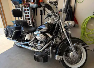 Gorgeous 2009 Heritage waiting to be taken home! Only 35000km Chromed to the max and accessorized in...