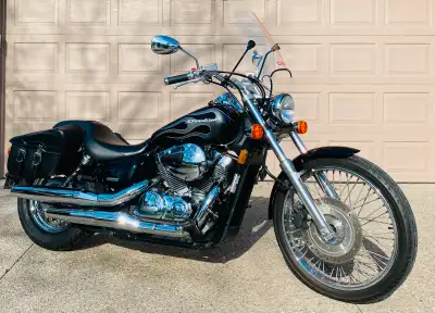This Honda shadow 750 is ready to go. Low mileage., brand new tires, easy to safety. A great first c...