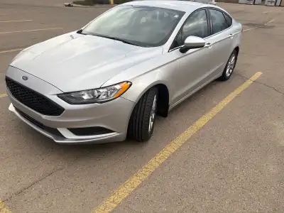 I am selling my 2017 Ford Fusion SE. it has around 30,000 km. It is clean inside and outside and sti...