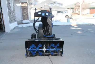 This Snow Joe snow blower has 3 forward speeds and a reverse, it is a 2m stage powered by 2 40 amp b...