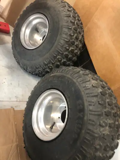 Atv rims and tires in very good condition bolt pattern 4x100 rims are 8x10 wide tires size 22-11-8 w...