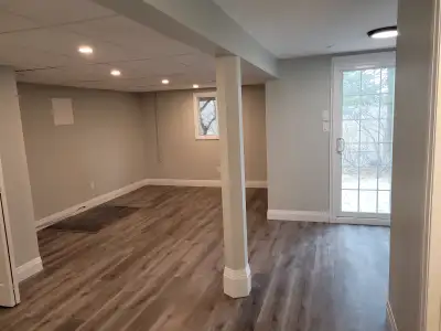 -newly renovated bachelor walk out apartment, including all new kitchen, bathroom, paint, flooring e...