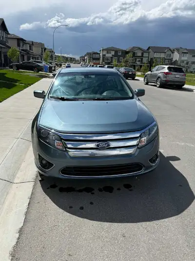 Selling dealership maintained 2nd owner senior driven 2011 Ford Fusion with 94900 km only. I have ca...