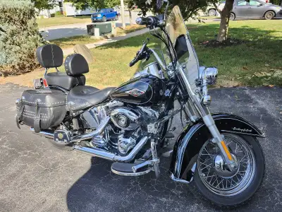SELLING MY 2012 HERITAGE SOFTAIL. NOT RIDING ENOUGH. ONLY 33000 KILOMETERS REGULAR OIL CHANGES WITH...