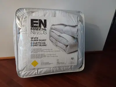 THIS KING SIZED COMFORTER IS MADE WITH 100% WHITE DUCK DOWN. IT'S STILL IN THE ORIGINAL PACKAGING -...