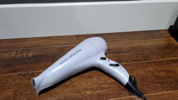 Vidal Sassoon hair dryer used only once to shrink film on window