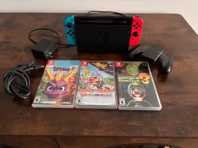 Nintendo switch and games. Rarely used. Comes with Spyro the dragon. Paper Mario. And Luigi’s mansio...