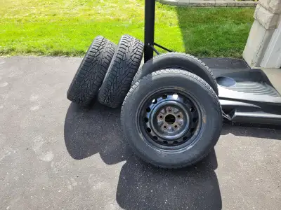 Set of 4 Nokian Nordman 7 winter tires with rims - 195 65 R15 Good condition with plenty of tread le...