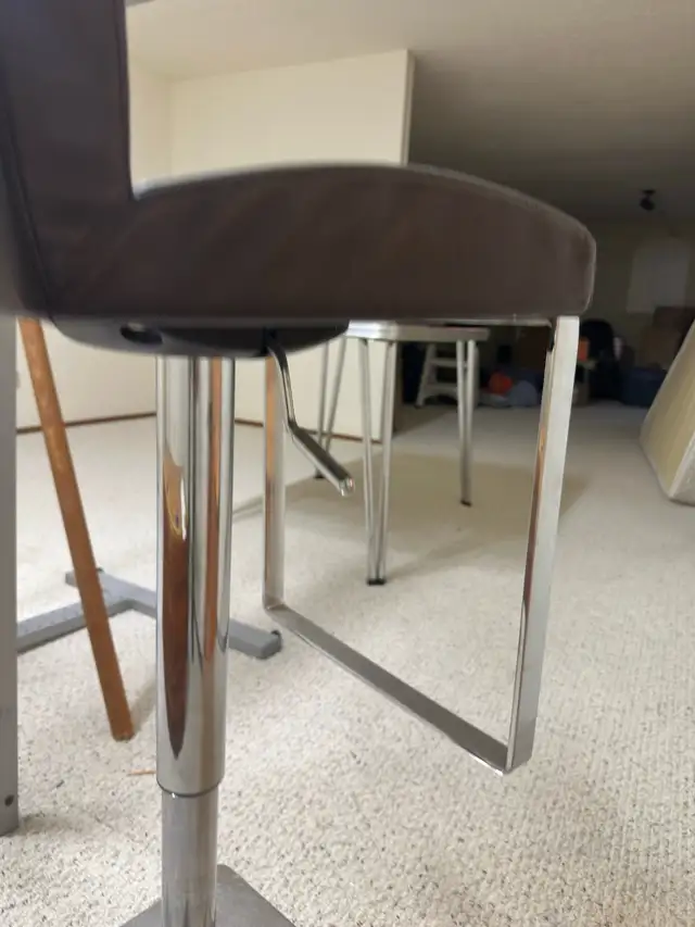 Two adjustable barstools417524279547668482