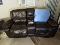 Free -- leather love seat recliner and natural gas BBQ.
