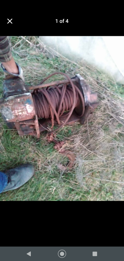 50 ton gear winch for sale asking 1000 dollars firm runs off of a PTO drive sprocket or by hydraulic...