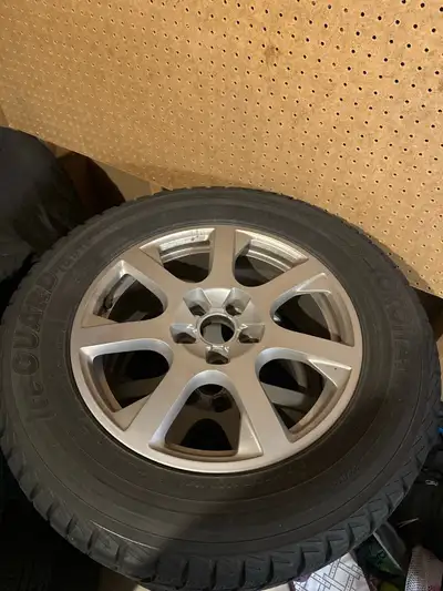 For sale are a set of four Yokohama IceGuard IG51 winter tires, size 235/65R17 108T, mounted on Audi...