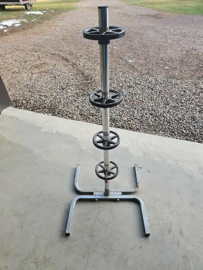 Two (2) stationary tire stands. Make an offer.