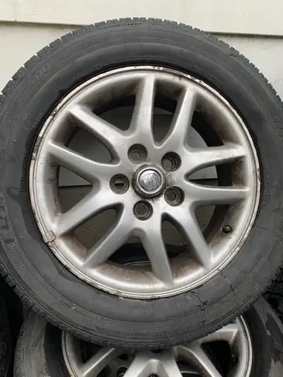 Set of (4) aluminum 16 x6J Toyota rims. In good condition. Tires are are in poor condition and shoul...