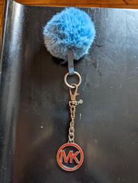 Michael Kors keychain and pompom