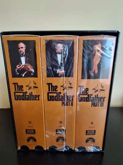 The Godfather trilogy collection on VHS. 2 &3 are Factory Sealed in the original plastic shrink wrap...