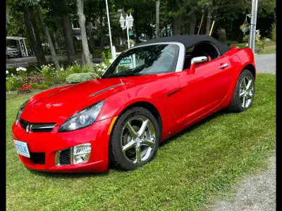 Pristine condition.. New Michelin tires. Convertible top replaced. 2 litre turbo 270hp. Red exterior...