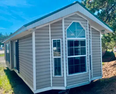 Experience tiny home living without sacrificing style or functionality in this beautifully customize...