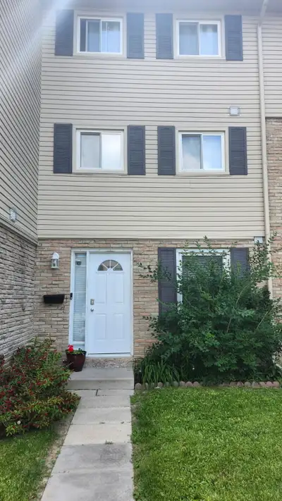 Bright and spacious open concept 4bedroom + 2baths condo town house with backyard for rent. Large fi...