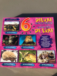 Never opened 6 intermediate kids animal puzzles 