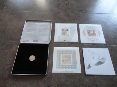 1999-2000 OFFICIAL MILLENNIUM KEEPSAKE STAMPS and COIN SET, View more