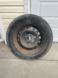 Full size 20” steel wheel and tire - spare 