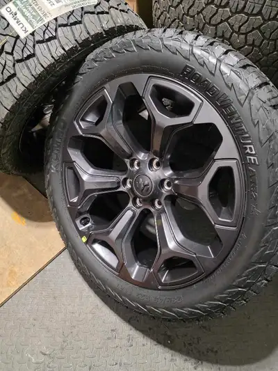 Brand new 285 45 R22 Kumho Winter Rated Tires on 22 inch OEM Dodge Ram 6 bolt Wheels. Tires and rims...