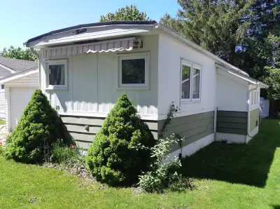 This updated/upgraded year-round mobile home is located in Huron Haven, a welcoming community minute...