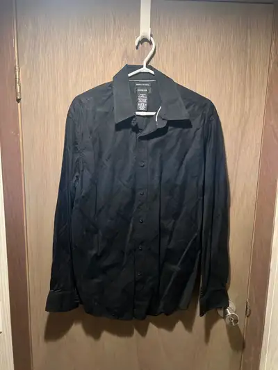 Men’s black dress shirt with a light pattern. Same as the white in my other ad. Size large. Excellen...