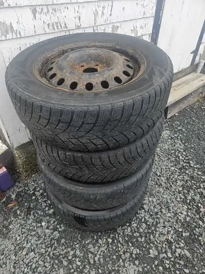 17" steel rims from a Honda CRV. 5 x 114.3mm hole pattern. Fitted with worn winter tires, tires are...