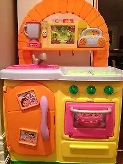 Dora's talking kitchen used $49 Disney Princess Magic Kitchen Playset $28 The Smurfs Mushroom House...