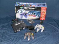 N64 console with 2 controllers & 8 games  original box manuals