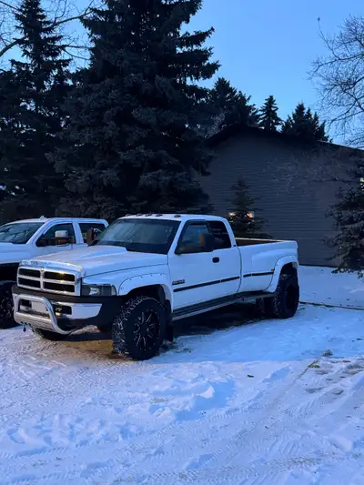 Tossing around the idea of a new truck and testing the waters on my current trucks. 1999 dodge ram 3...