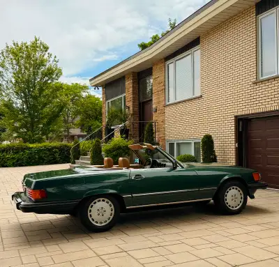 1989 Mercedes-Benz 560SL in rare Pine Green with Palomino interior. This car is in mint condition an...