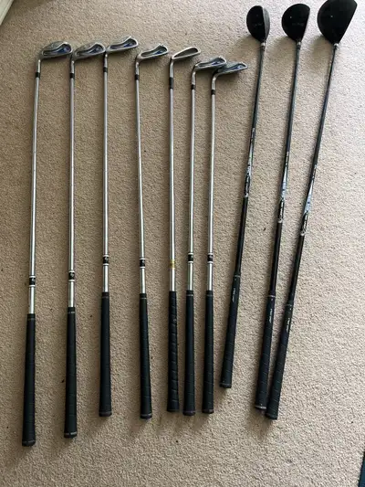 John Daly used golf clubs Driver, 5W, 3 hybrid, PW-4 Iron