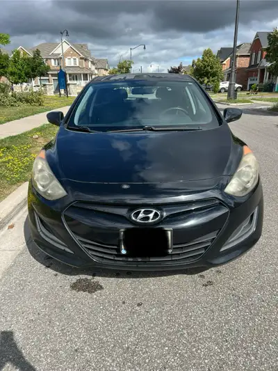 Selling my 2013 Hyundai Elantra GT (Hatchback) — black, automatic, third owner. • Well maintained wi...