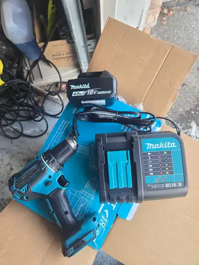 Makita charger and battery, View more