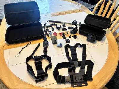 Selling my GoPro HERO10 Black with a big bundle of accessories. Everything is in great working condi...
