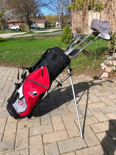 golf set- bag with stand and 9 clubs, View more