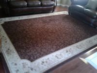 Carpet in brown and beige colour